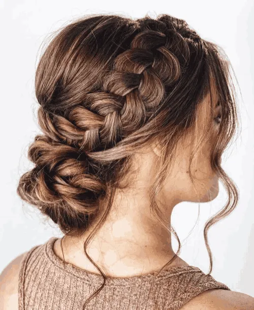 Braided Bun with Face-Framing Tendrils